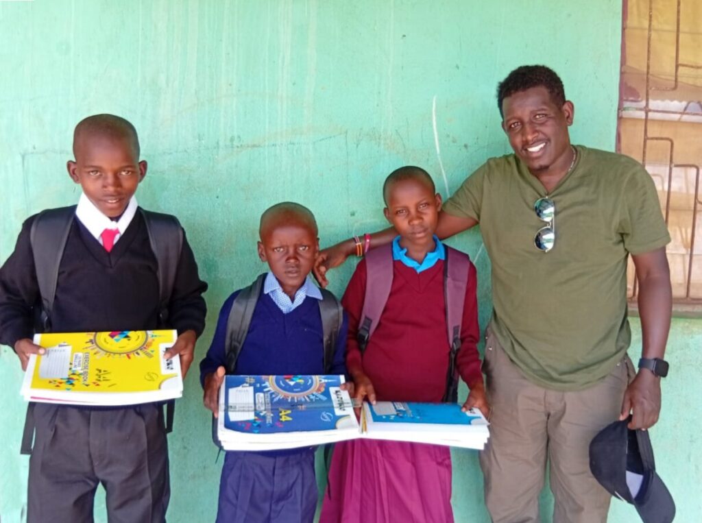 mit Schulbedarf ausgestattete Patenkinder